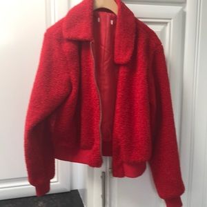 Red zip front faux fur bomber jacket